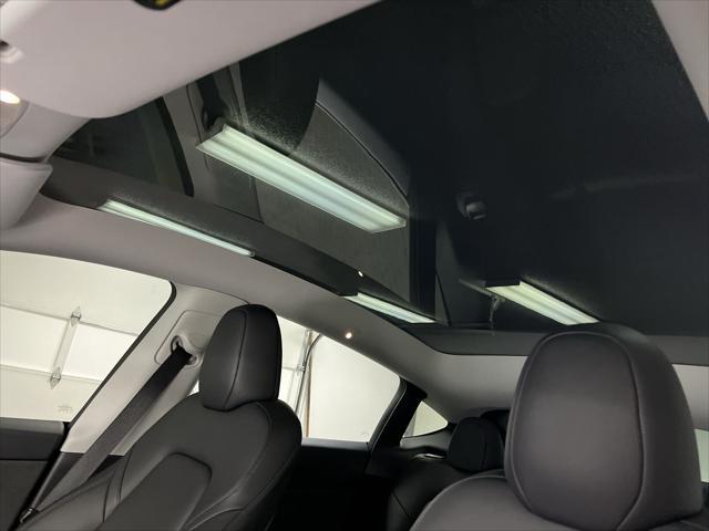 used 2024 Tesla Model Y car, priced at $40,313