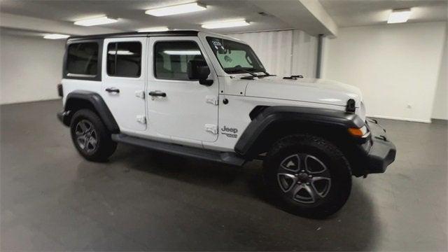 used 2019 Jeep Wrangler Unlimited car, priced at $27,336