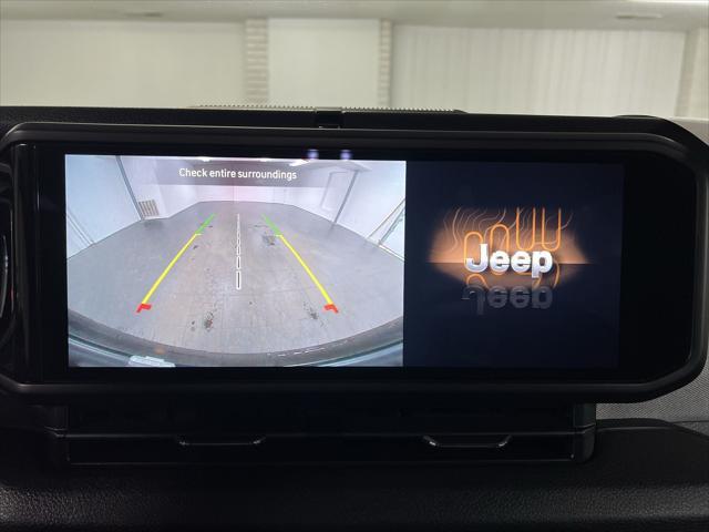 used 2024 Jeep Wrangler car, priced at $33,668