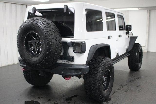 used 2015 Jeep Wrangler Unlimited car, priced at $23,336