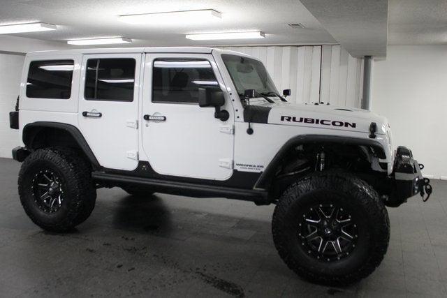 used 2015 Jeep Wrangler Unlimited car, priced at $23,336