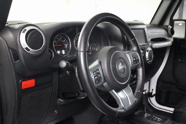 used 2015 Jeep Wrangler Unlimited car, priced at $23,336