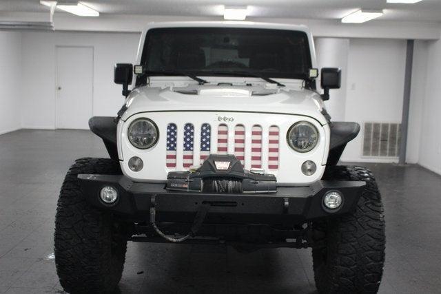 used 2015 Jeep Wrangler Unlimited car, priced at $23,336