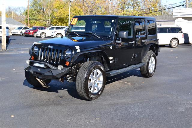 used 2013 Jeep Wrangler Unlimited car, priced at $16,991