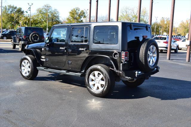 used 2013 Jeep Wrangler Unlimited car, priced at $16,991