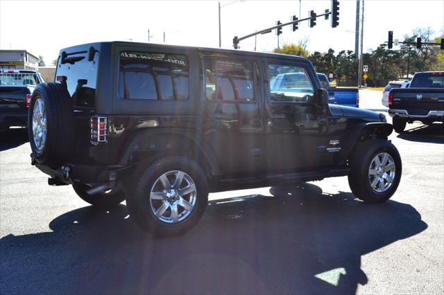 used 2013 Jeep Wrangler Unlimited car, priced at $16,991