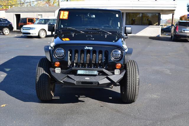 used 2013 Jeep Wrangler Unlimited car, priced at $16,991