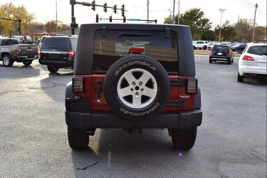 used 2010 Jeep Wrangler Unlimited car, priced at $13,991