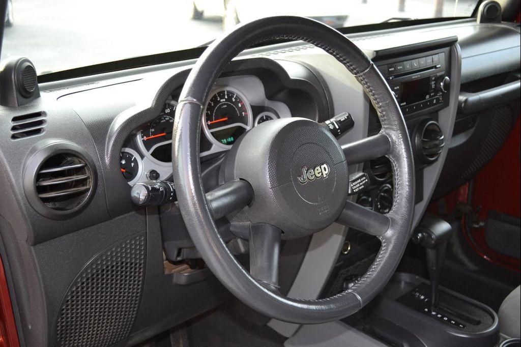 used 2010 Jeep Wrangler Unlimited car, priced at $13,991