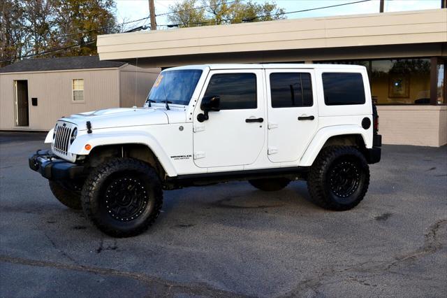 used 2015 Jeep Wrangler Unlimited car, priced at $26,991