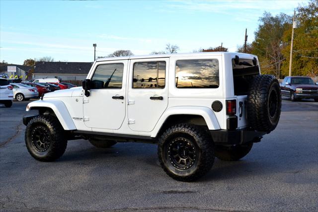 used 2015 Jeep Wrangler Unlimited car, priced at $26,991