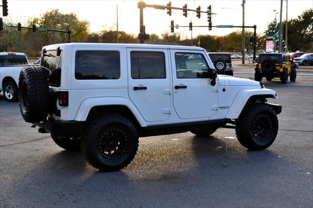 used 2015 Jeep Wrangler Unlimited car, priced at $26,991