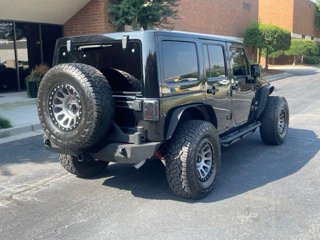 used 2016 Jeep Wrangler Unlimited car, priced at $23,999