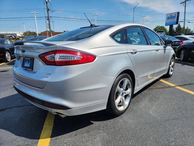 used 2014 Ford Fusion car, priced at $6,970