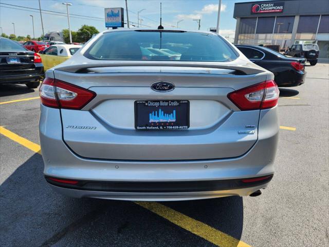 used 2014 Ford Fusion car, priced at $6,970