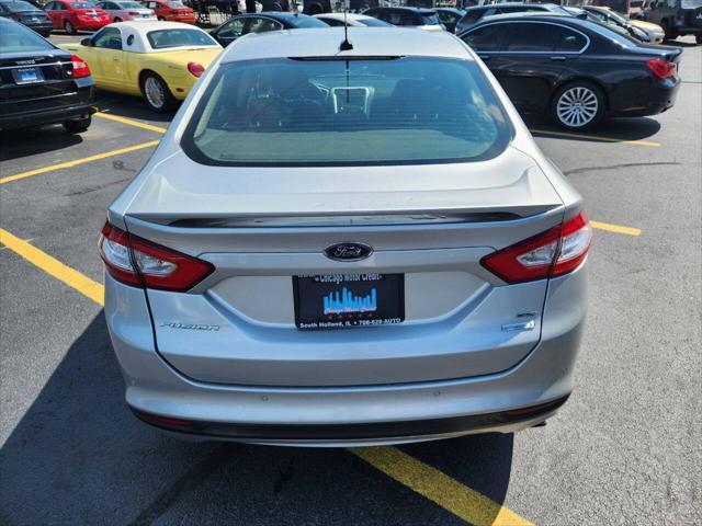 used 2014 Ford Fusion car, priced at $6,970