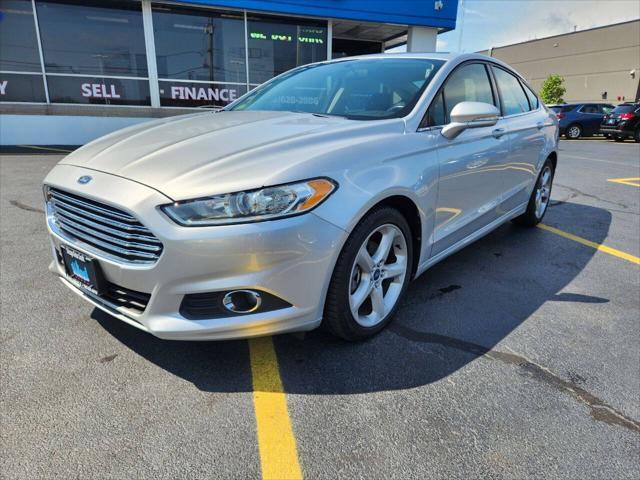 used 2014 Ford Fusion car, priced at $6,970