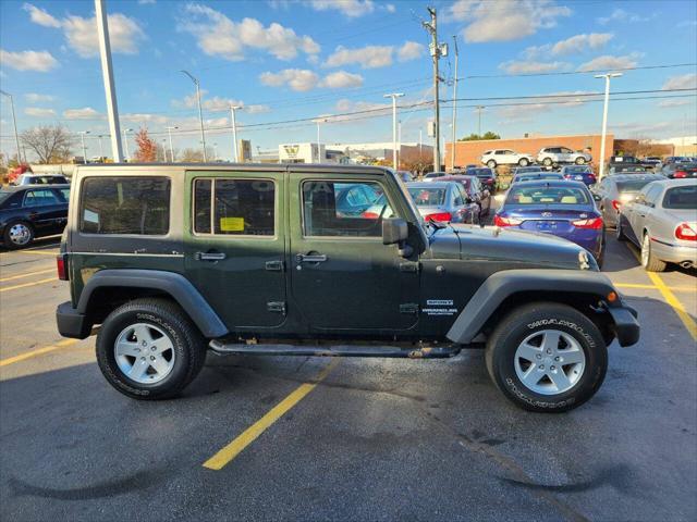 used 2011 Jeep Wrangler Unlimited car, priced at $12,950