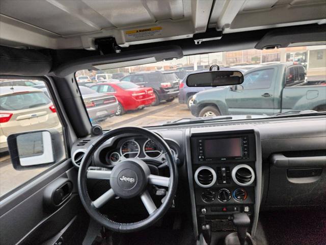 used 2010 Jeep Wrangler Unlimited car, priced at $12,450