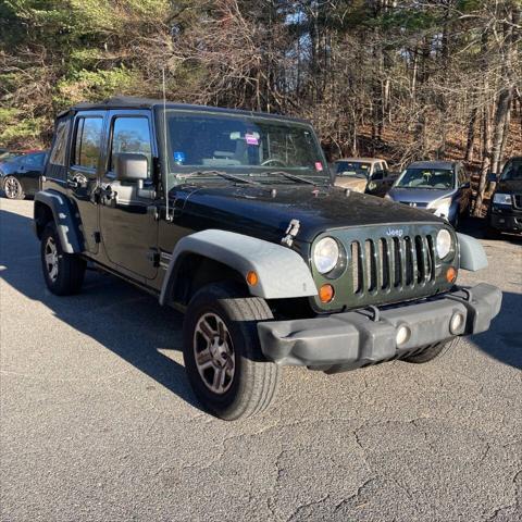 used 2011 Jeep Wrangler Unlimited car, priced at $14,950