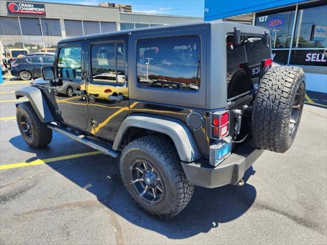 used 2012 Jeep Wrangler Unlimited car, priced at $11,970