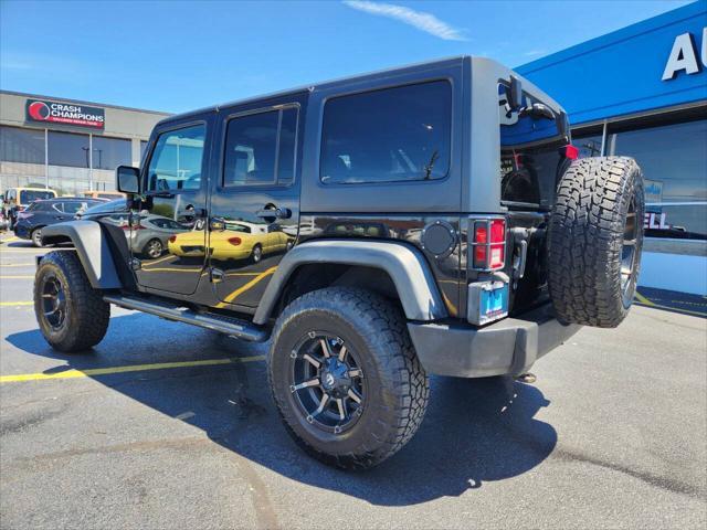 used 2012 Jeep Wrangler Unlimited car, priced at $11,970