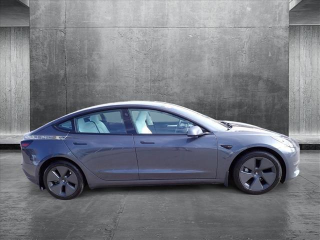 used 2023 Tesla Model 3 car, priced at $30,799