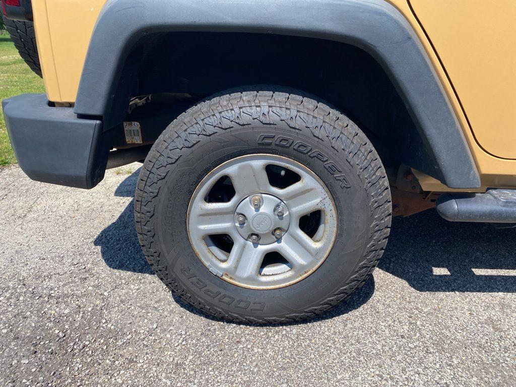 used 2014 Jeep Wrangler Unlimited car, priced at $19,874
