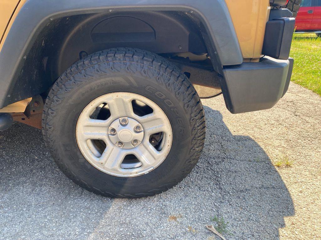 used 2014 Jeep Wrangler Unlimited car, priced at $19,874