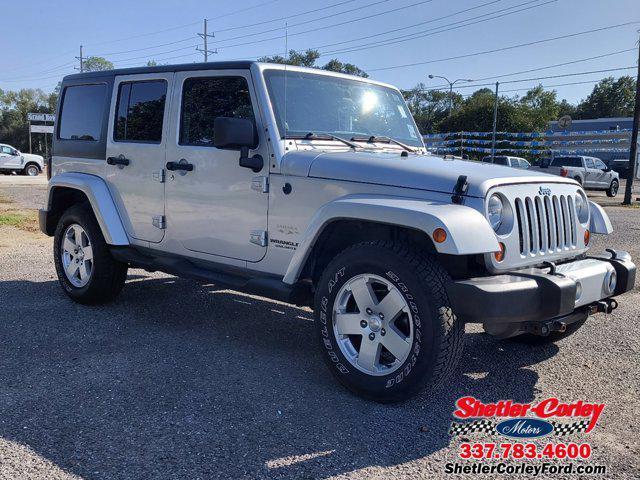 used 2011 Jeep Wrangler Unlimited car, priced at $16,900