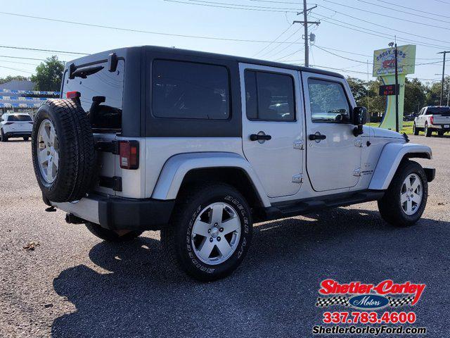 used 2011 Jeep Wrangler Unlimited car, priced at $16,900