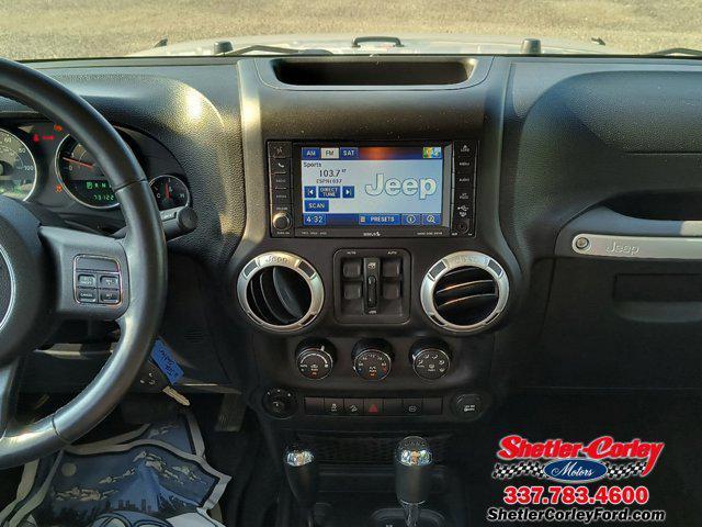 used 2011 Jeep Wrangler Unlimited car, priced at $16,900