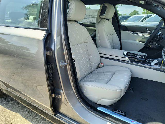 new 2025 BMW 740 car, priced at $110,605