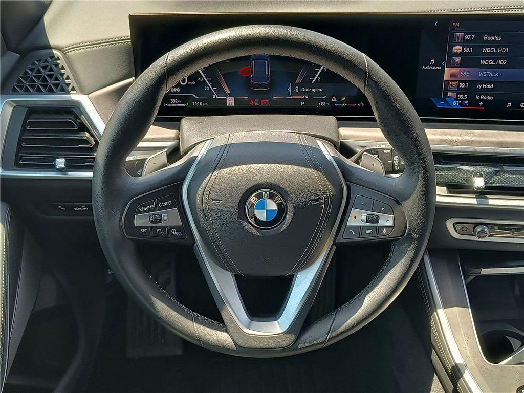 used 2024 BMW X5 car, priced at $59,870