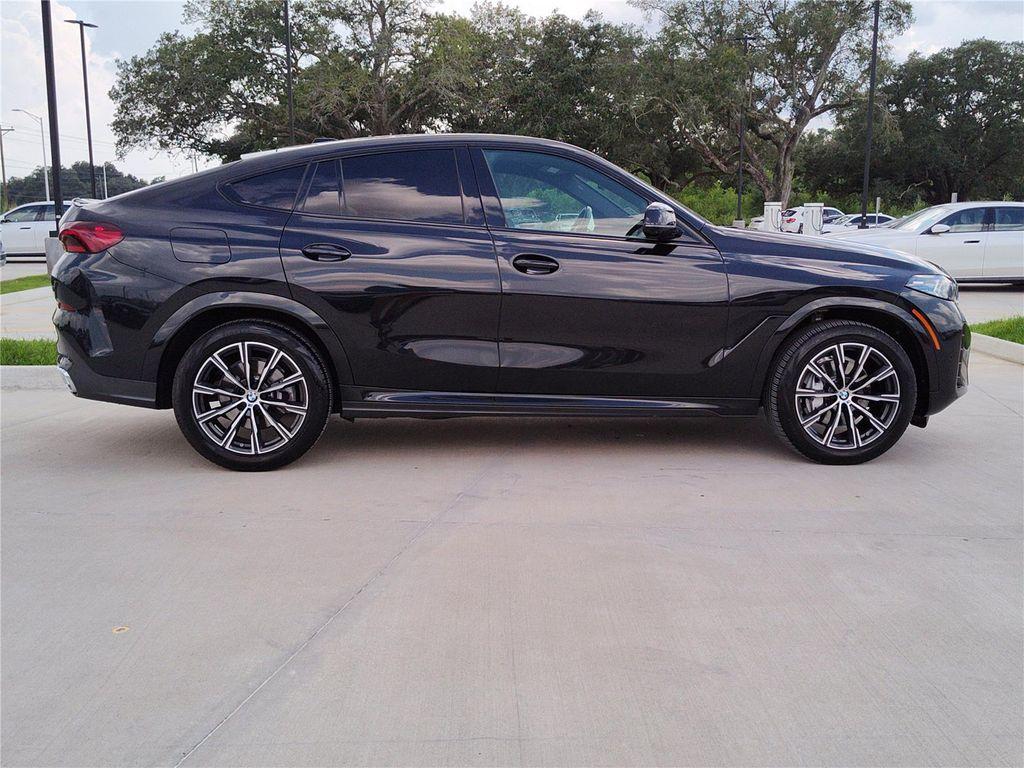 used 2025 BMW X6 car, priced at $65,470