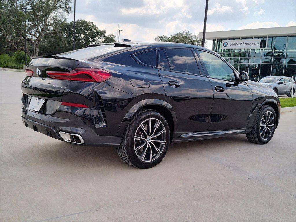 used 2025 BMW X6 car, priced at $65,470