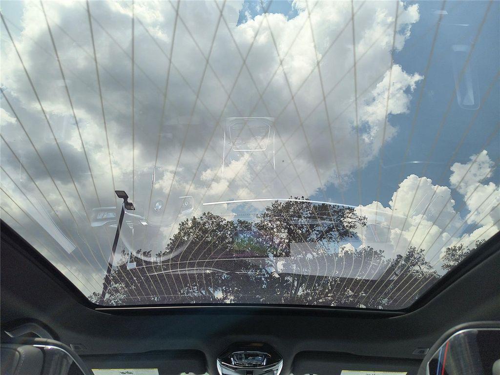 new 2025 BMW 740 car, priced at $110,975