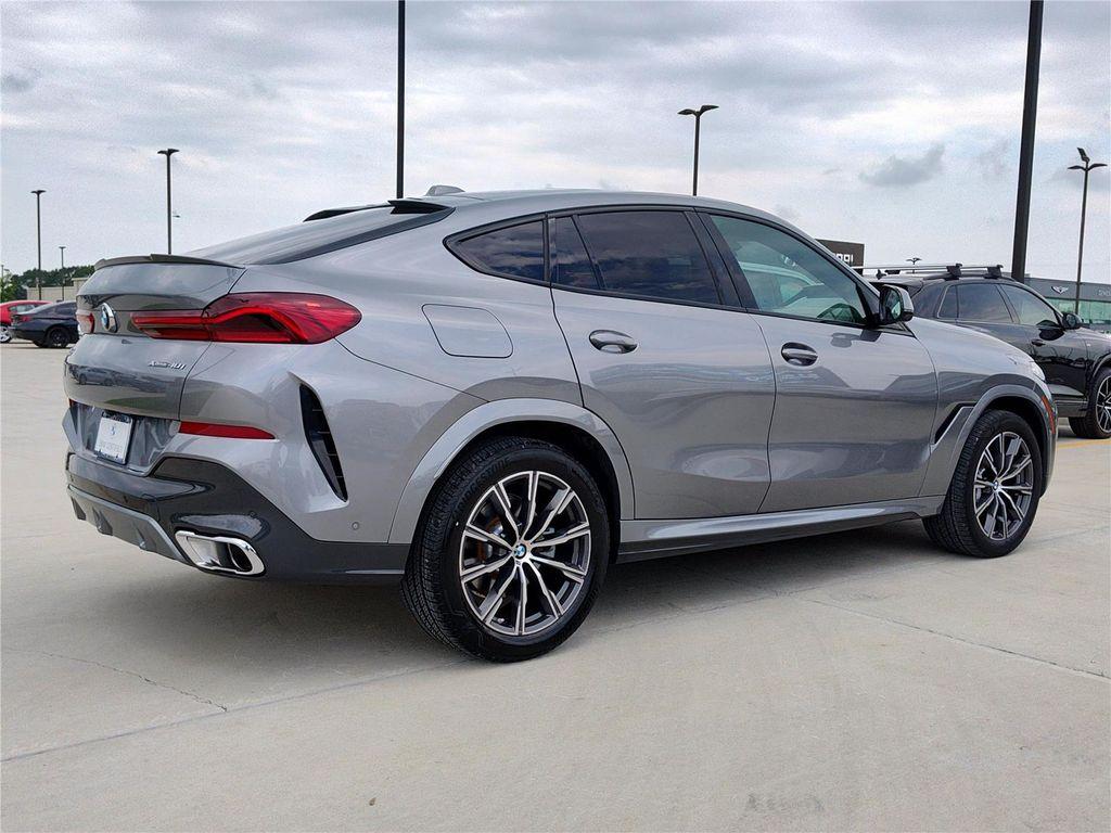 used 2025 BMW X6 car, priced at $70,770