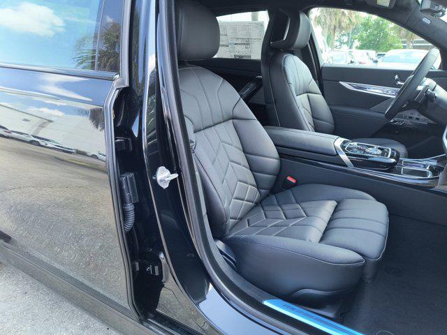 new 2025 BMW 740 car, priced at $112,255