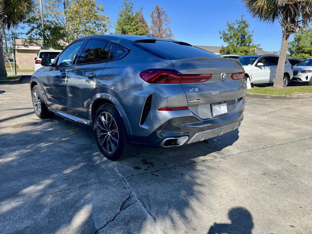 used 2024 BMW X6 car, priced at $67,488