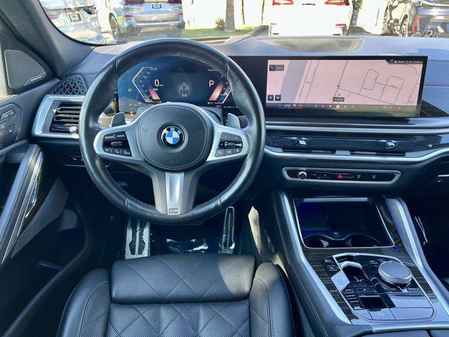 used 2024 BMW X6 car, priced at $67,488