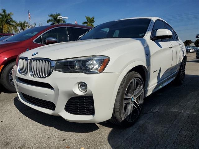 used 2016 BMW X4 car, priced at $14,590