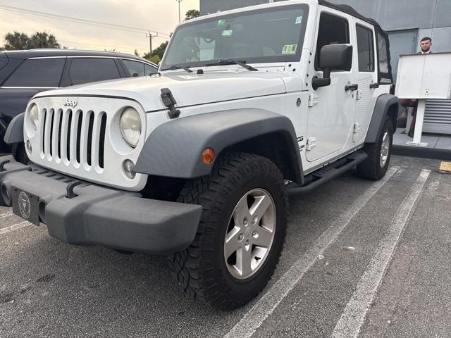 used 2015 Jeep Wrangler Unlimited car, priced at $12,990