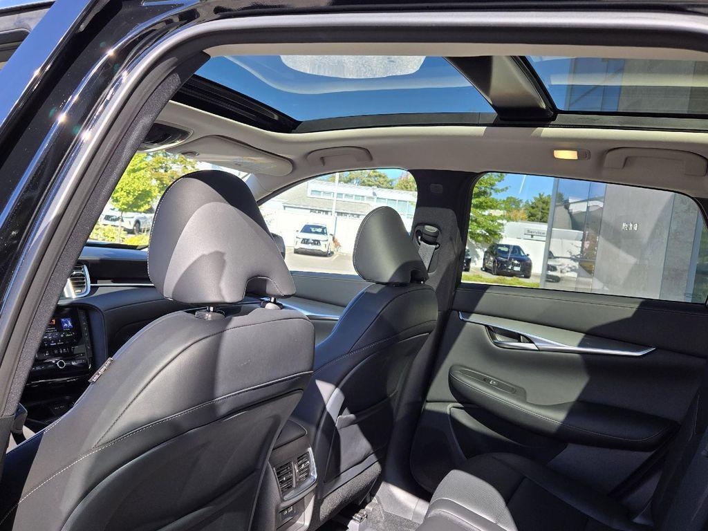 used 2025 INFINITI QX50 car, priced at $36,900