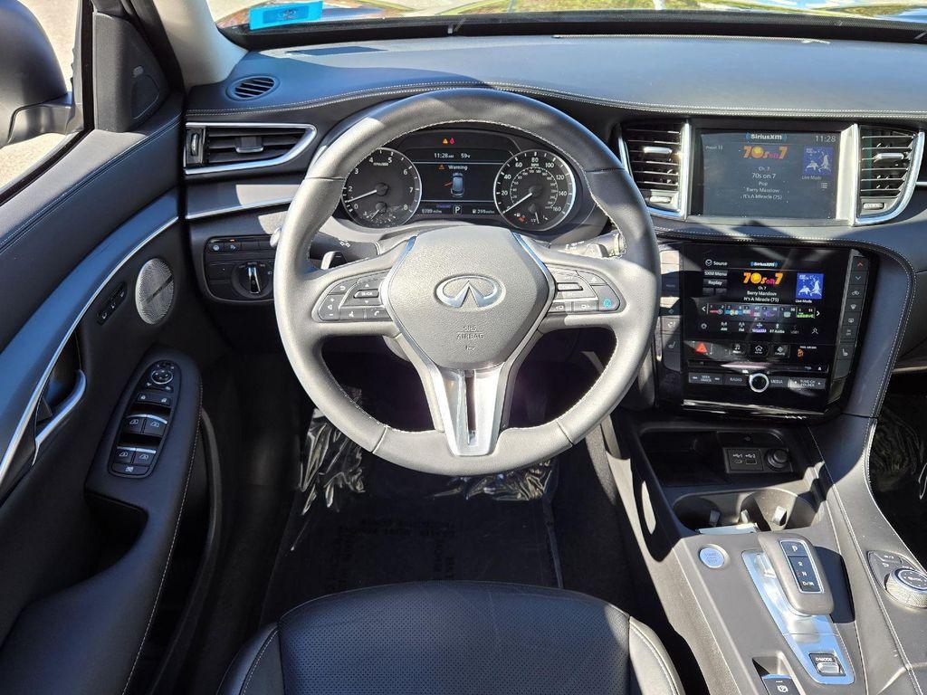 used 2025 INFINITI QX50 car, priced at $36,900