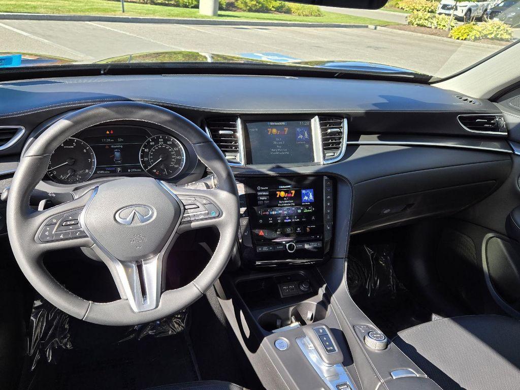 used 2025 INFINITI QX50 car, priced at $36,900