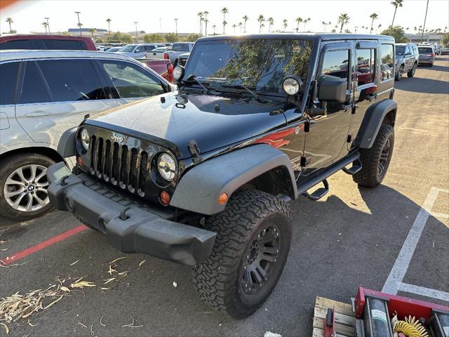 used 2013 Jeep Wrangler Unlimited car, priced at $13,990