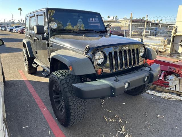 used 2013 Jeep Wrangler Unlimited car, priced at $13,990