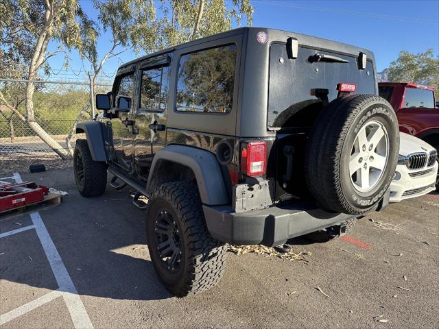 used 2013 Jeep Wrangler Unlimited car, priced at $13,990