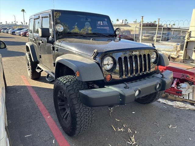 used 2013 Jeep Wrangler Unlimited car, priced at $13,990